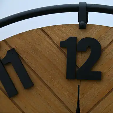 wooden clock,wooden wall clock close up detail on numbers